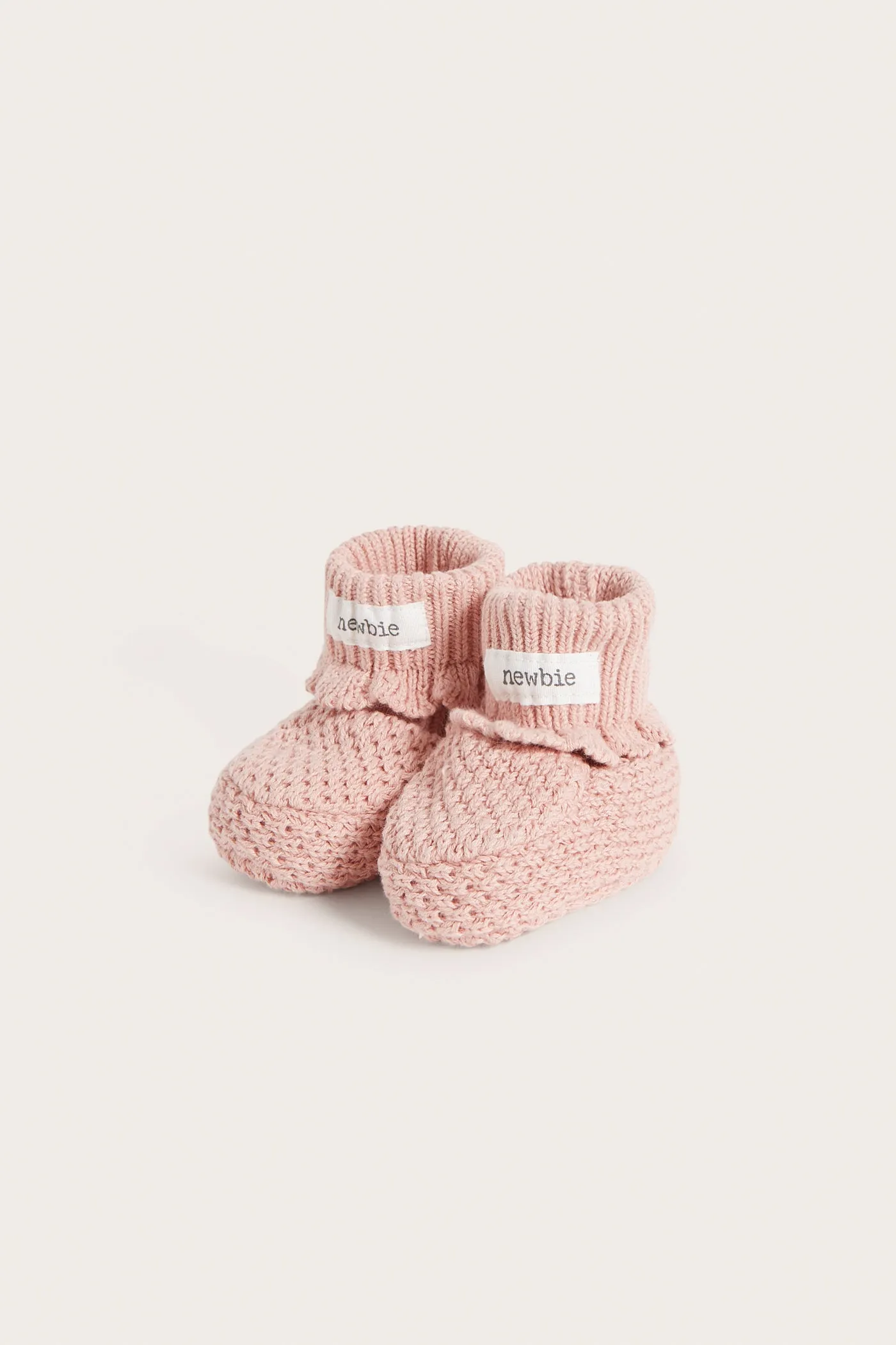 Baby pink knitted booties