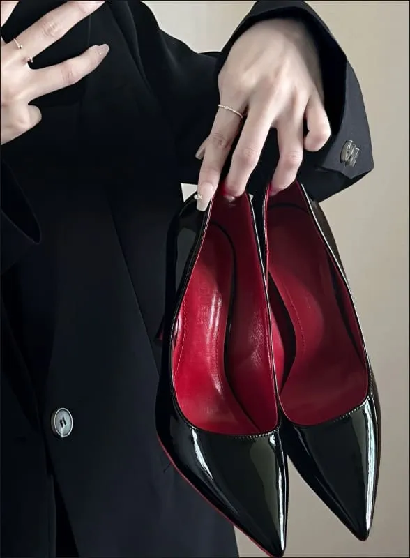 High Heel Black Shoes with Elegant Red Soles for Bold Style