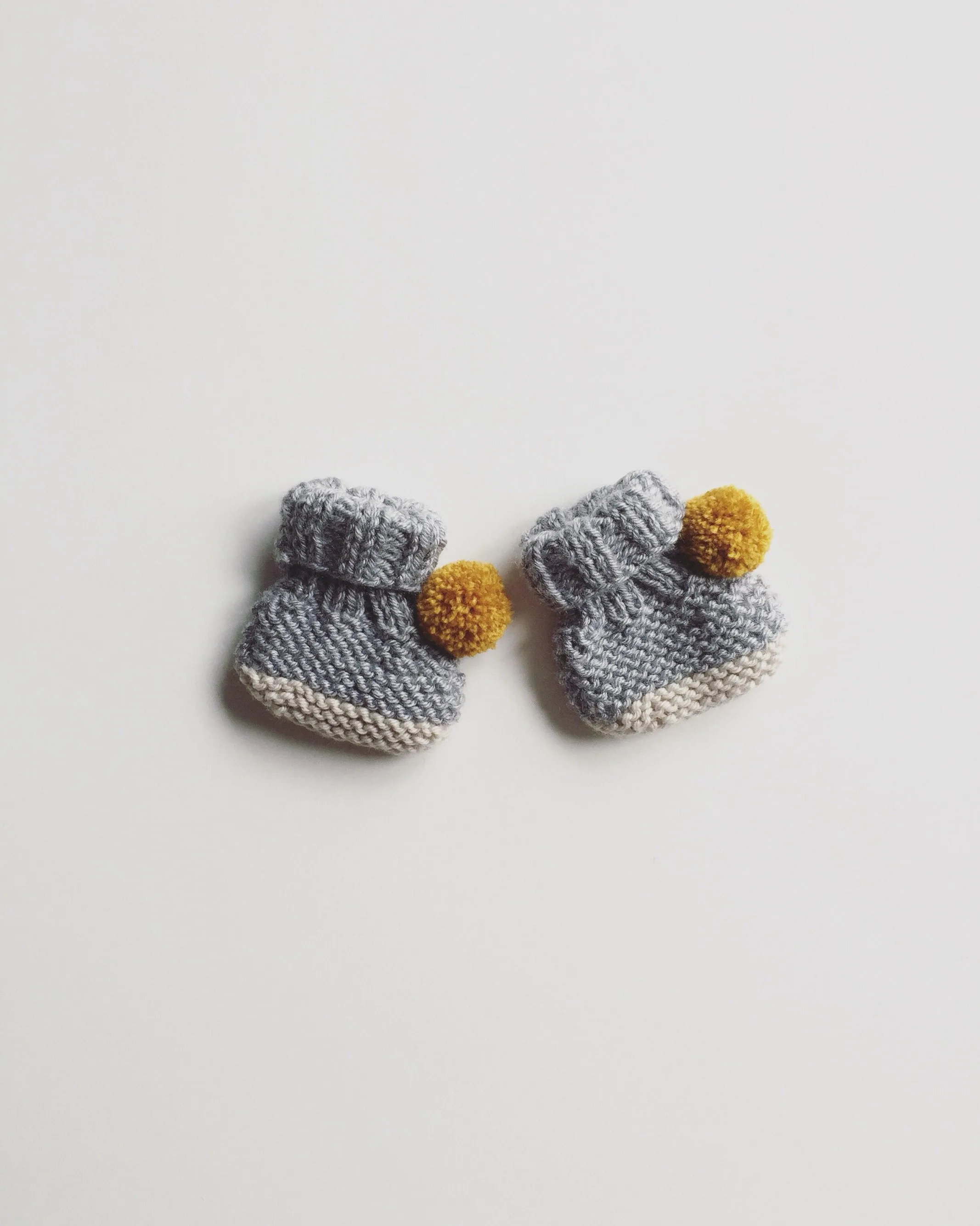 knitted booties PomPom